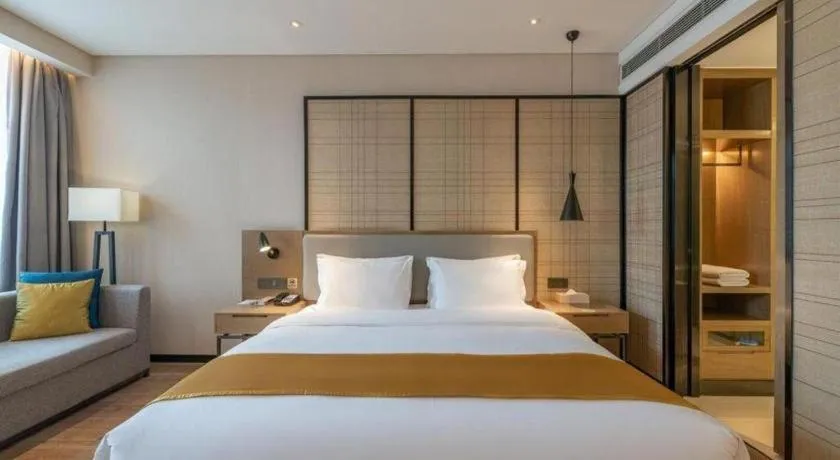 Bed in Echarm Hotel Jinan Railway Station Daming Lake