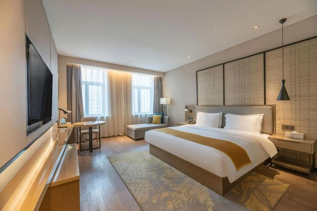 Bed in Echarm Hotel Jinan Railway Station Daming Lake