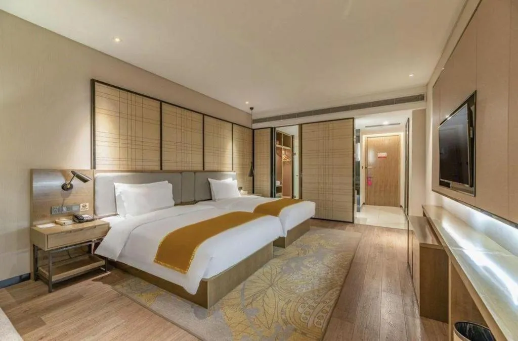 Bed in Echarm Hotel Jinan Railway Station Daming Lake