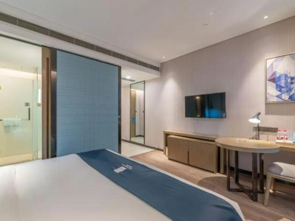 Bed in Echarm Hotel Jinan Railway Station Daming Lake