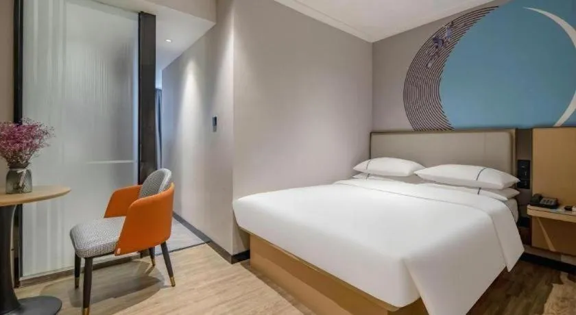 Bed in City Comfort Inn Wuzhou Municipal Square