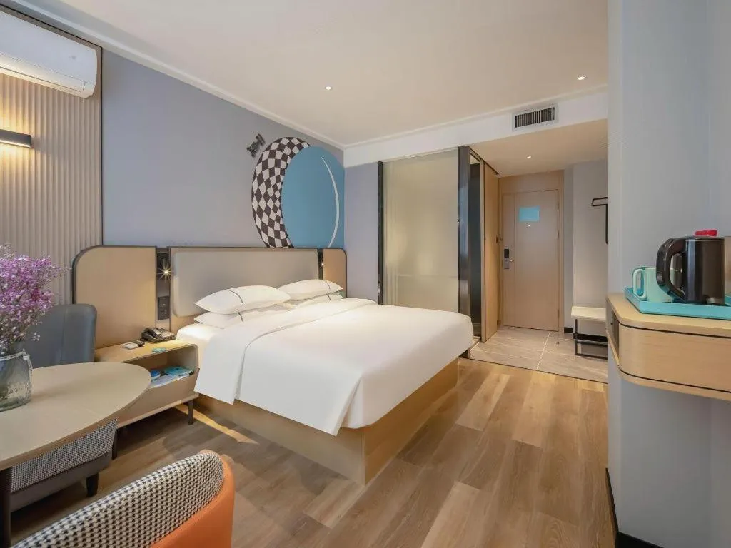 Bed in City Comfort Inn Wuzhou Municipal Square