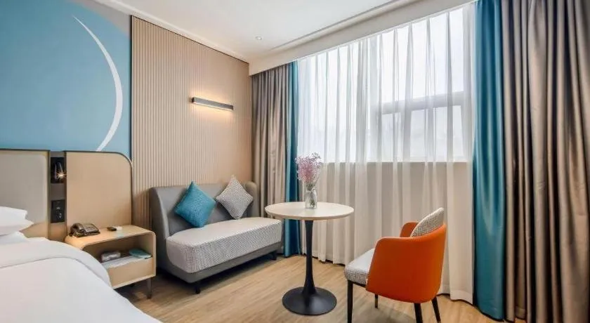 Bed in City Comfort Inn Wuzhou Municipal Square