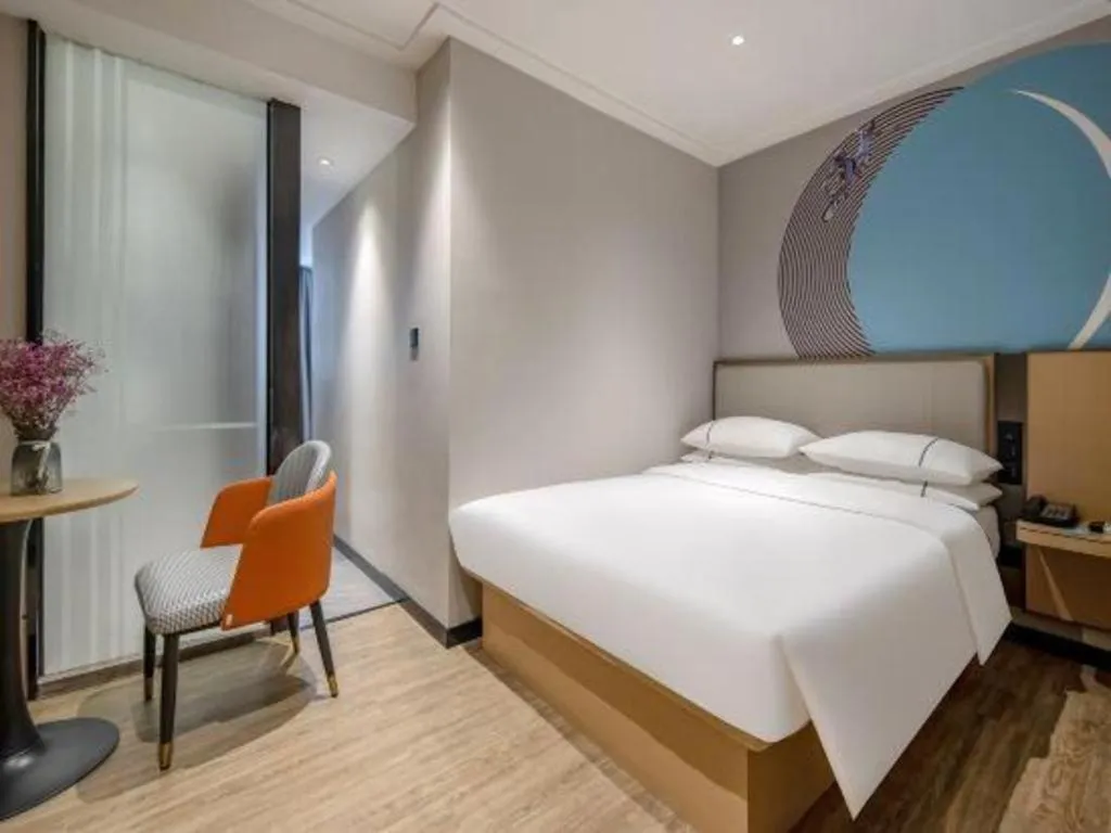 Bed in City Comfort Inn Wuzhou Municipal Square