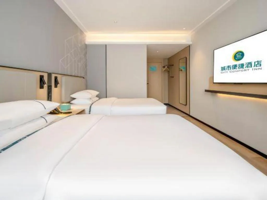 Bed in City Comfort Inn Wuzhou Municipal Square