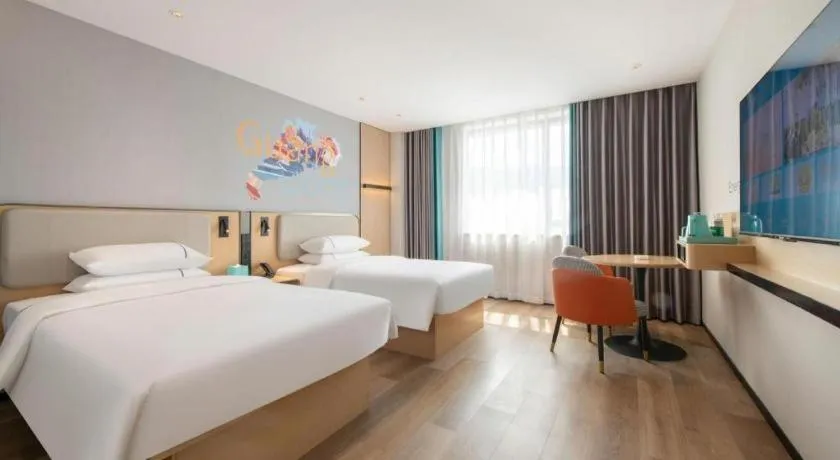 Bed in City Comfort Inn Wuzhou Municipal Square