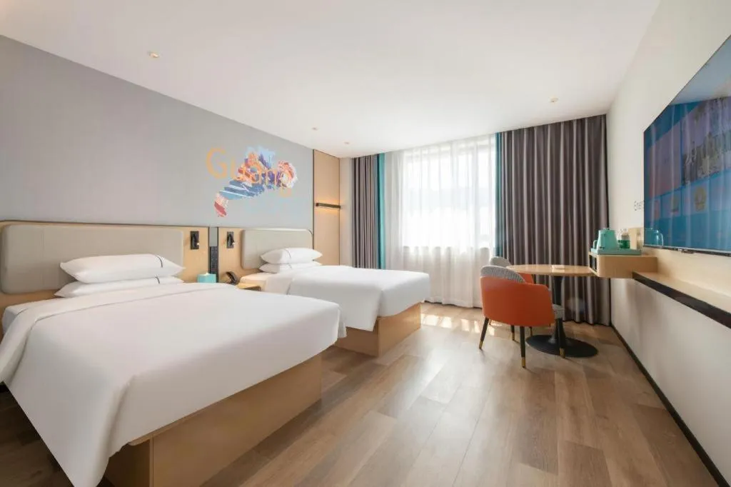 Bed in City Comfort Inn Wuzhou Municipal Square