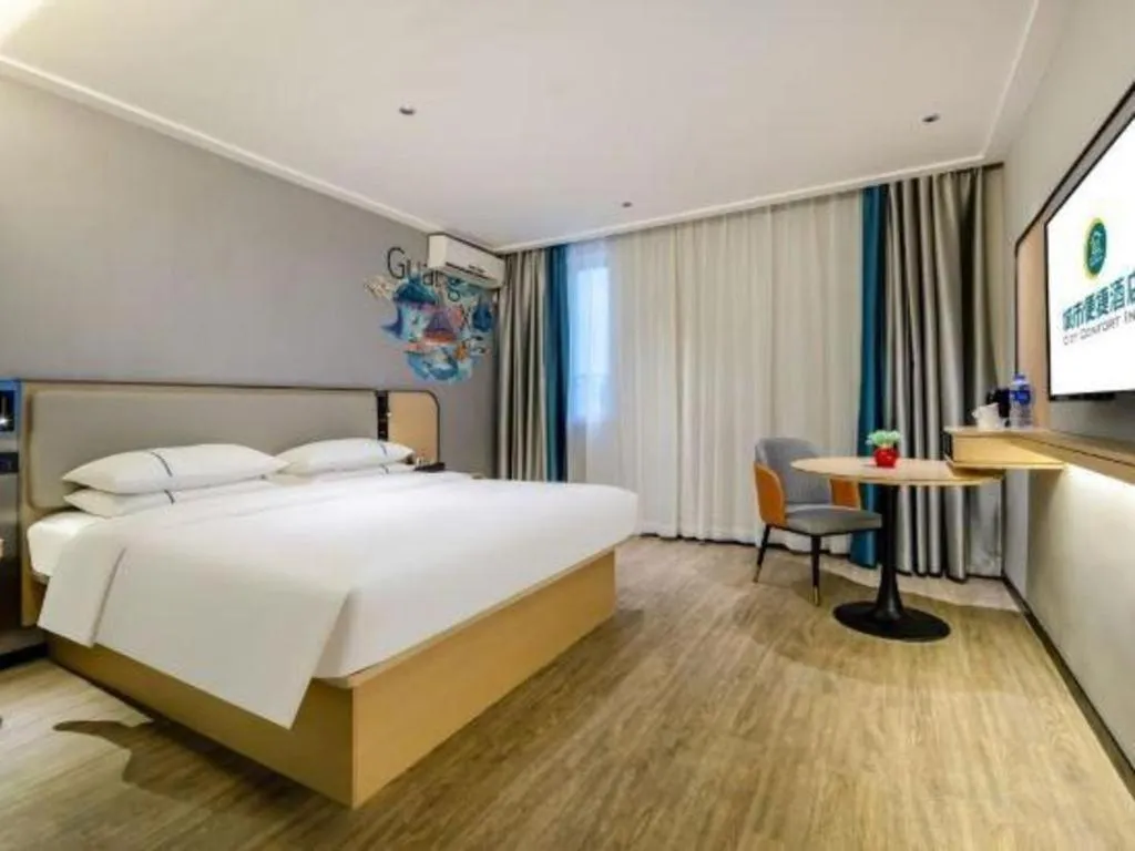 Bed in City Comfort Inn Wuzhou Municipal Square