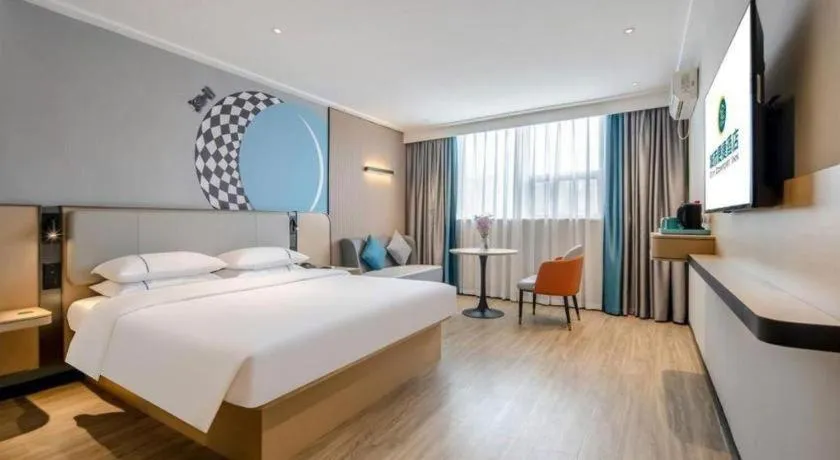 Bed in City Comfort Inn Wuzhou Municipal Square