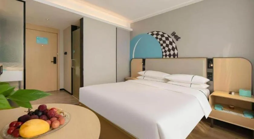 Bed in City Comfort Inn Wuzhou Municipal Square