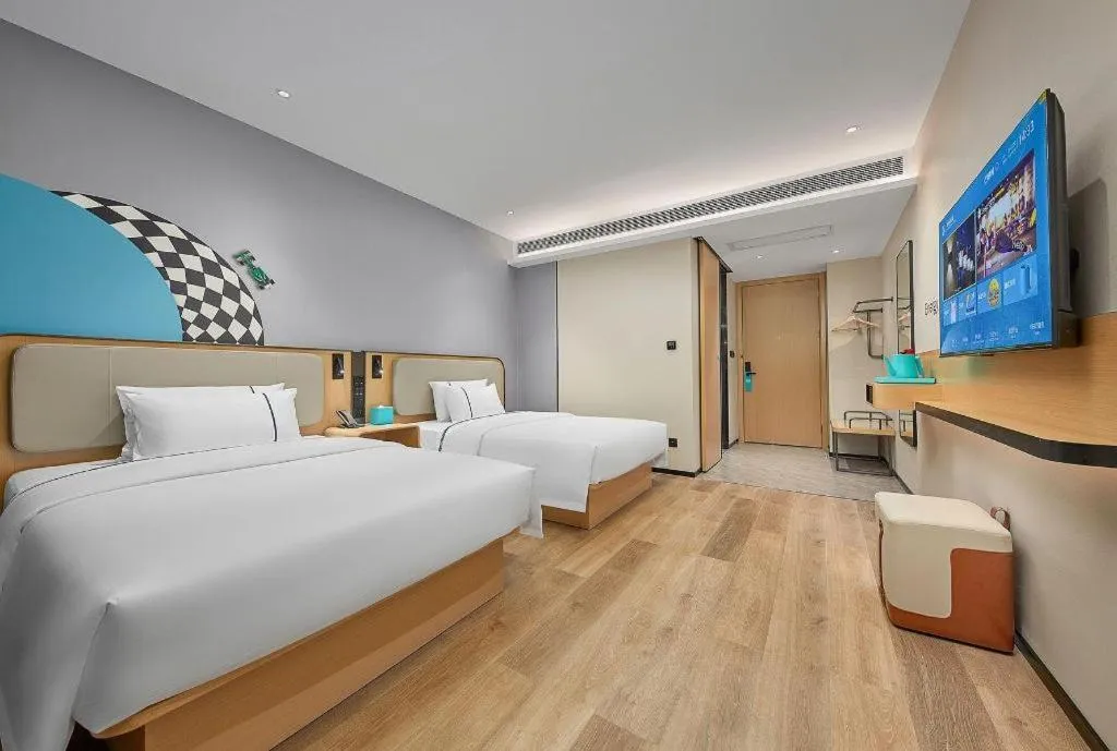 Bed in City Comfort Inn Wuzhou Municipal Square