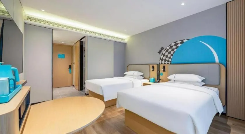 Bed in City Comfort Inn Wuzhou Municipal Square