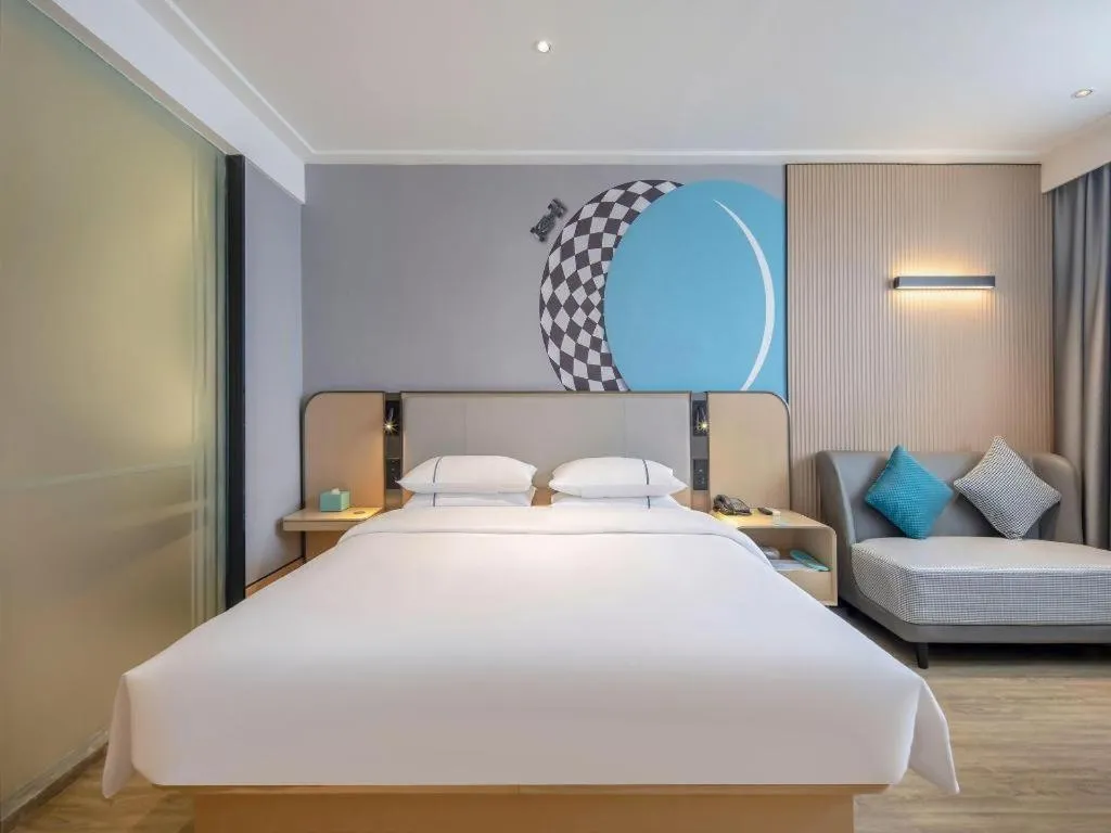 Bed in City Comfort Inn Wuzhou Municipal Square