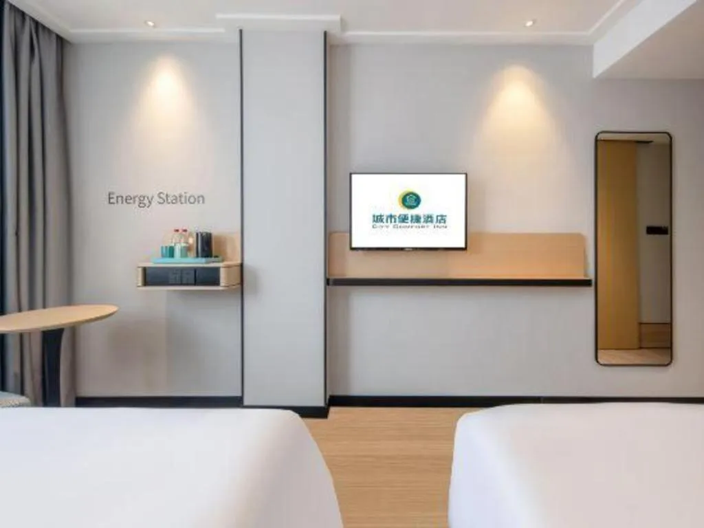 Bed in City Comfort Inn Wuzhou Municipal Square