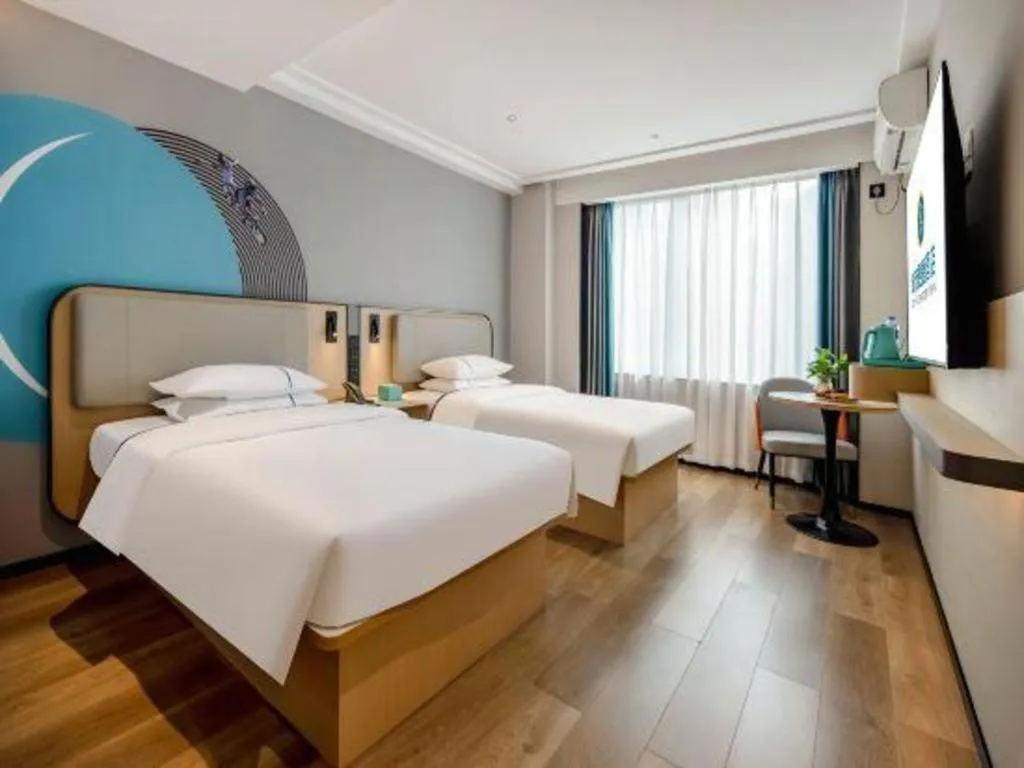 Bed in City Comfort Inn Wuzhou Municipal Square