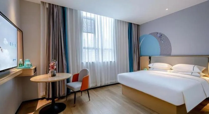 Bed in City Comfort Inn Wuzhou Municipal Square