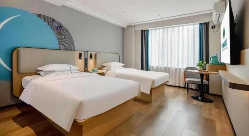 Bed in City Comfort Inn Wuzhou Municipal Square