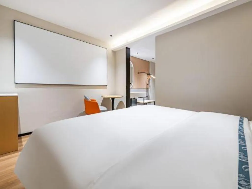 Bed in City Comfort Inn Wuzhou Municipal Square