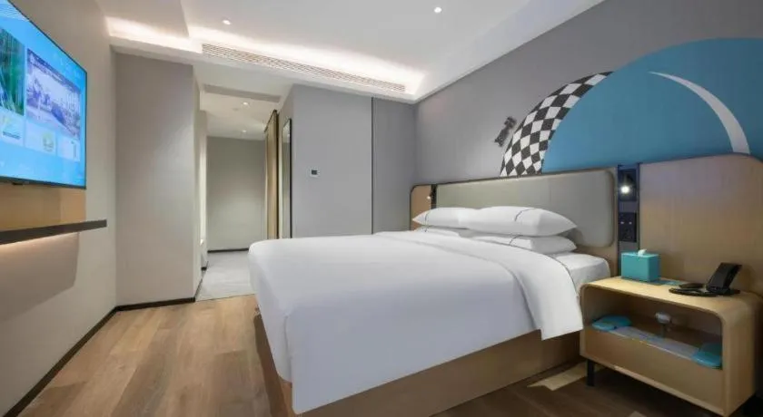 Bed in City Comfort Inn Wuzhou Municipal Square