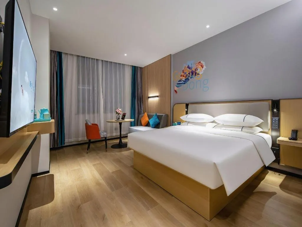 Bed in City Comfort Inn Wuzhou Municipal Square