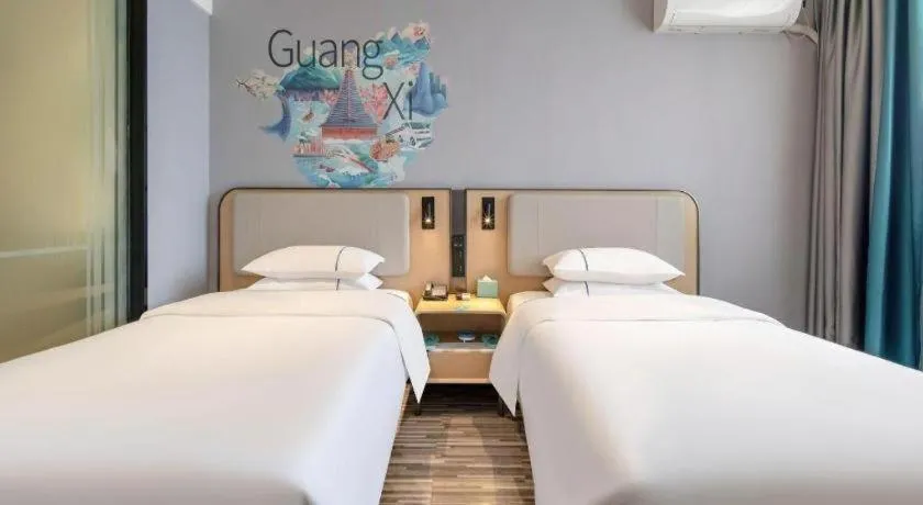 Bed in City Comfort Inn Wuzhou Municipal Square