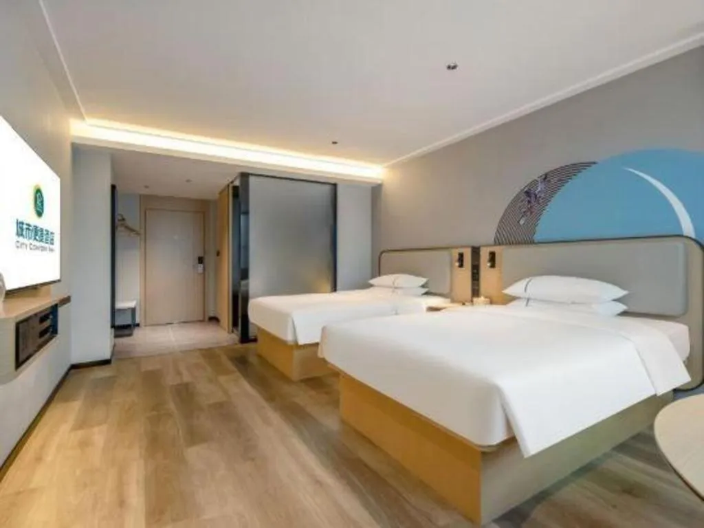 Bed in City Comfort Inn Wuzhou Municipal Square