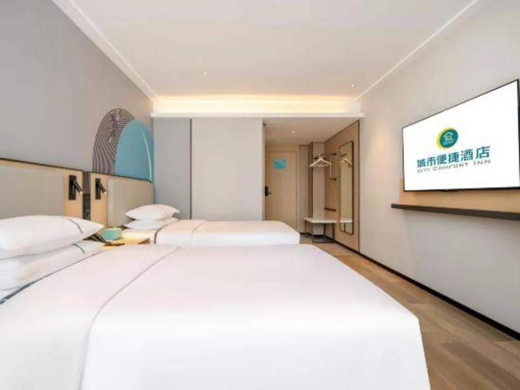 Bed in City Comfort Inn Wuzhou Municipal Square