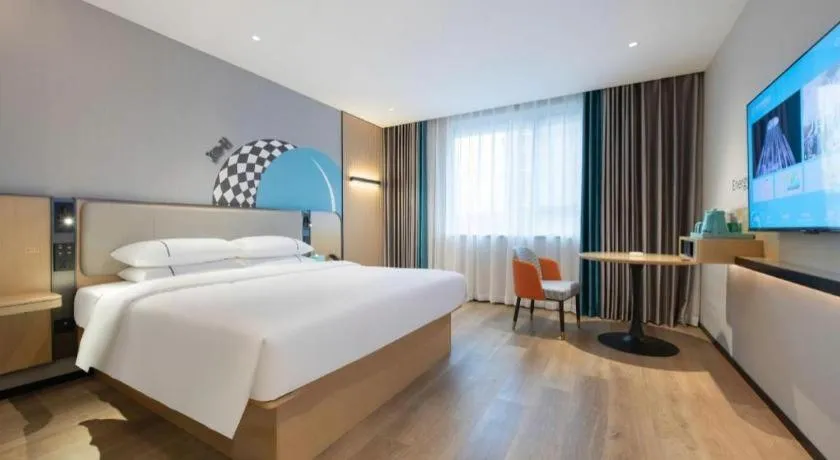 Bed in City Comfort Inn Wuzhou Municipal Square