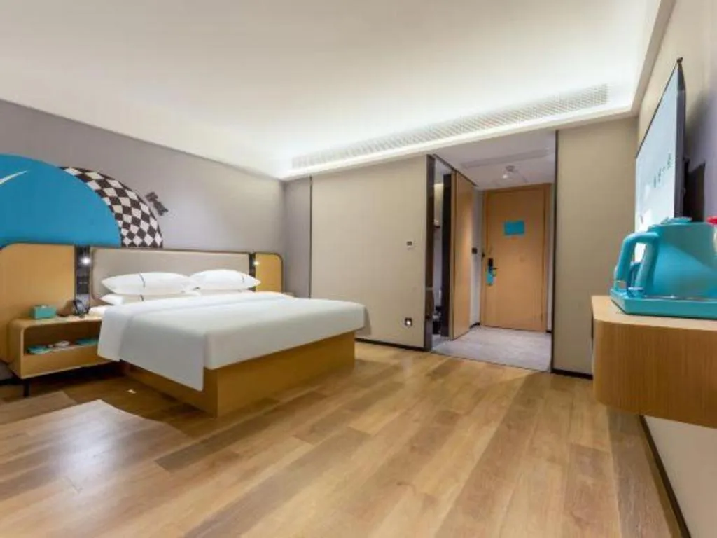 Bed in City Comfort Inn Wuzhou Municipal Square