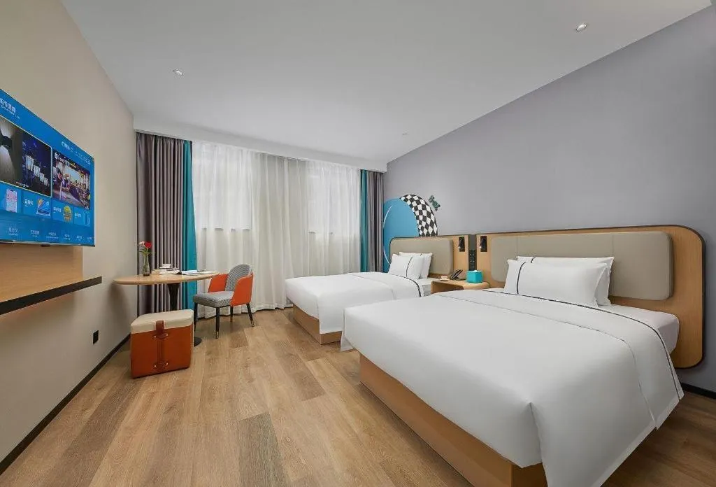 Bed in City Comfort Inn Wuzhou Municipal Square