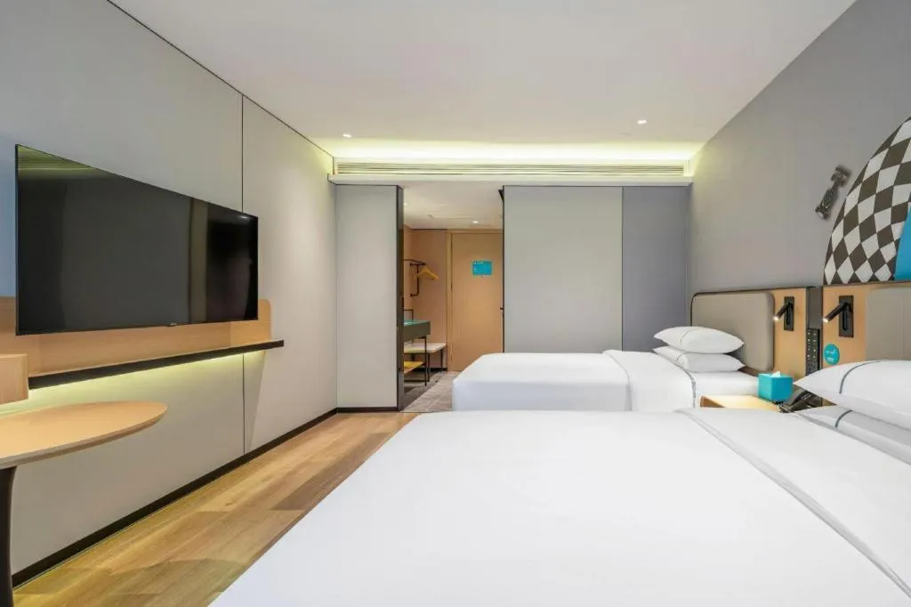 Bed in City Comfort Inn Wuzhou Municipal Square