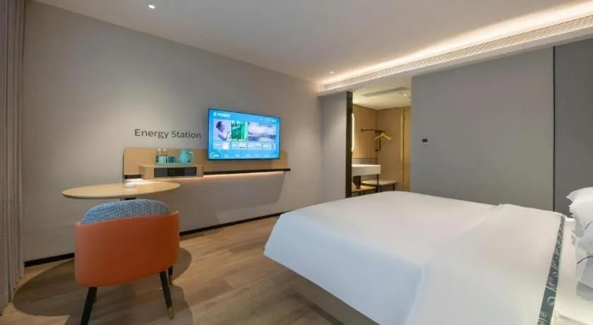 Bed in City Comfort Inn Wuzhou Municipal Square