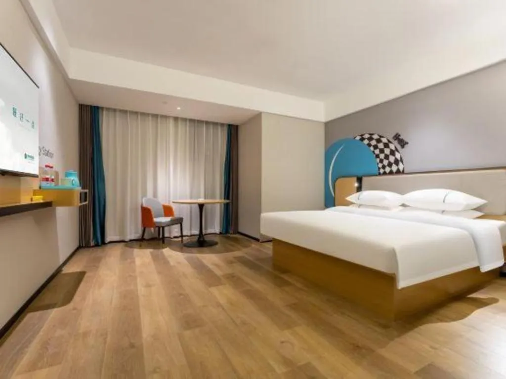 Bed in City Comfort Inn Wuzhou Municipal Square