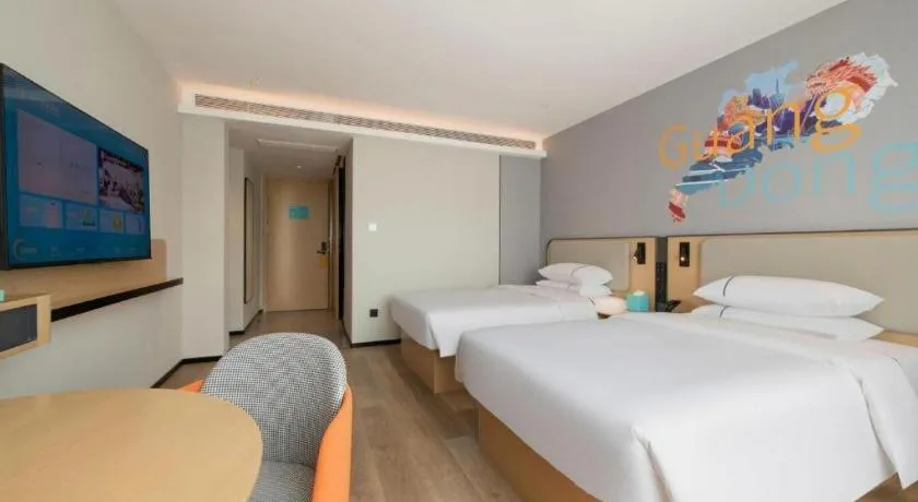 Bed in City Comfort Inn Wuzhou Municipal Square