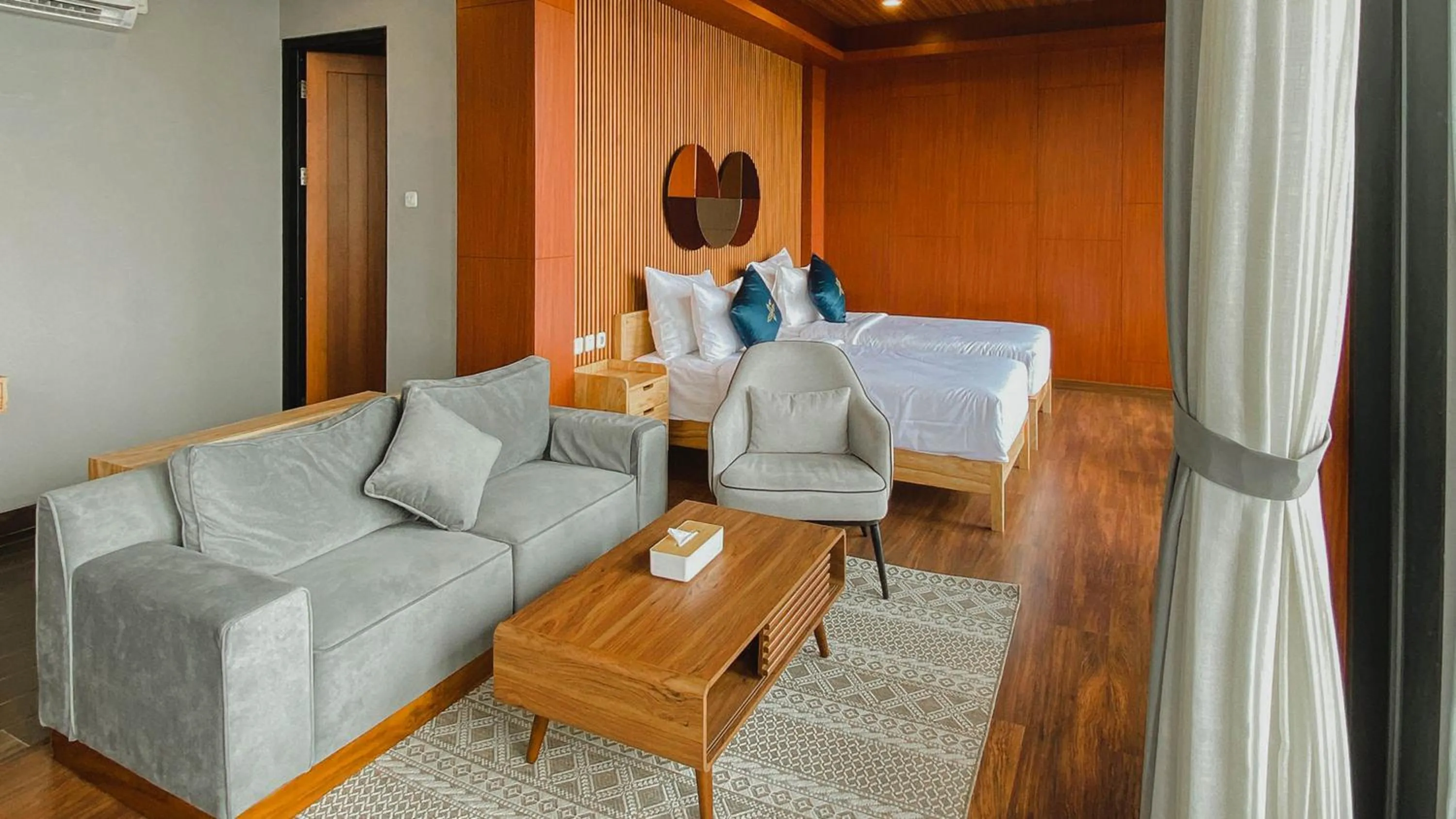 Seating area, Bed in Damar Langit Resort