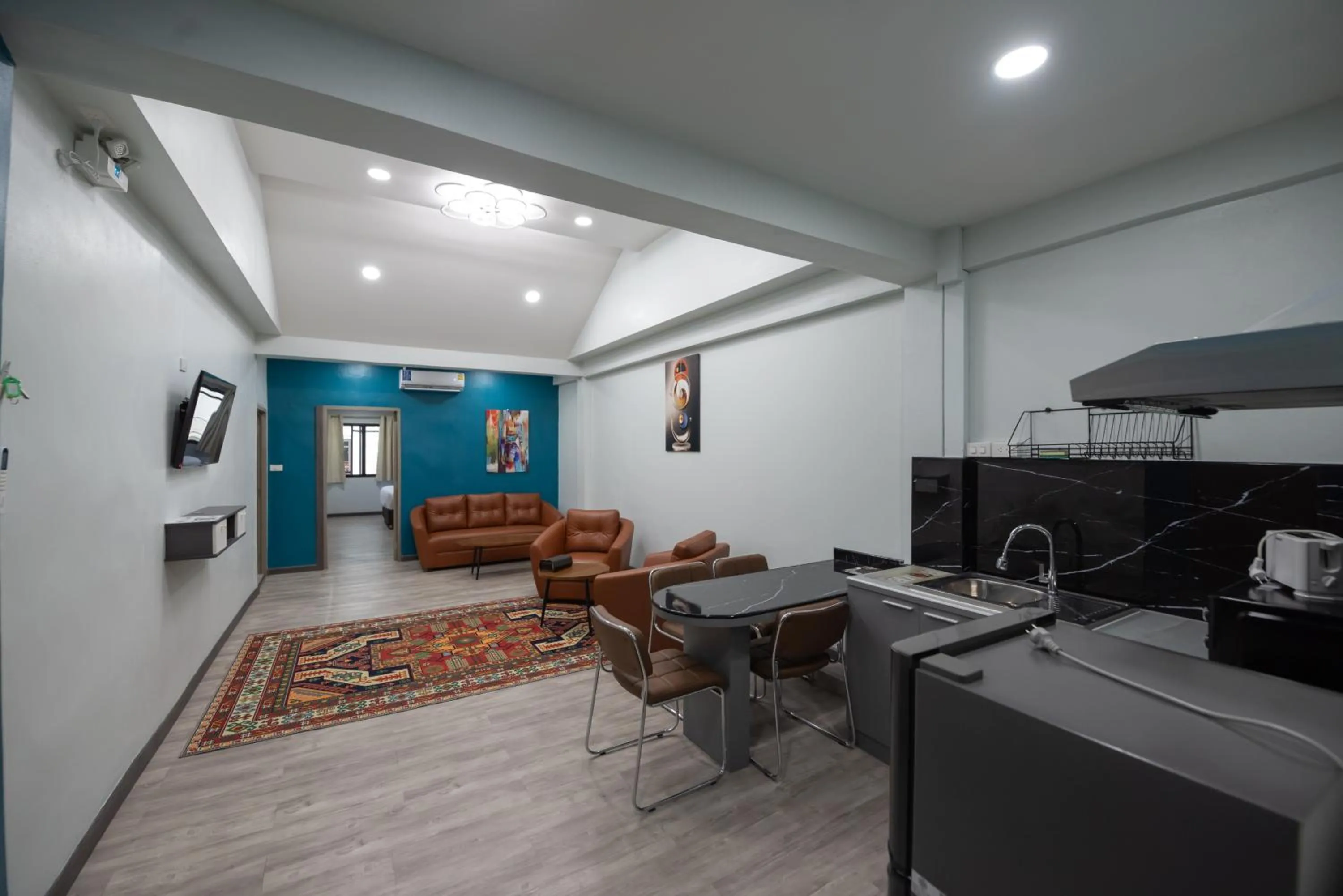 Kitchen or kitchenette in SkyLink Homes - Pattunaam - Airport Link & BTS Chidlom