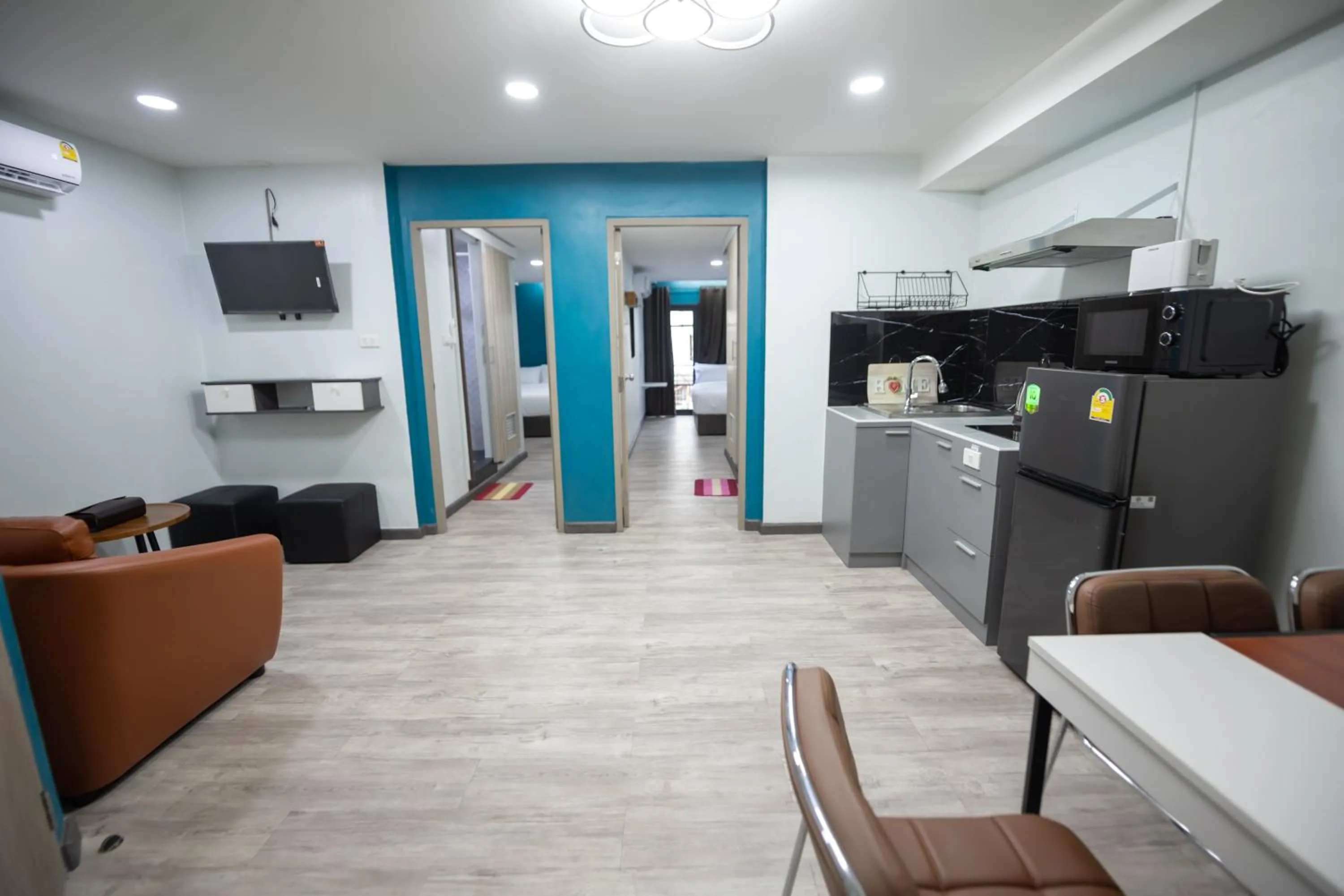 Kitchen or kitchenette in SkyLink Homes - Pattunaam - Airport Link & BTS Chidlom