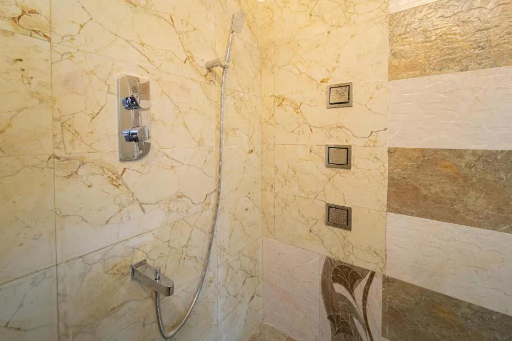 Shower in AR Phalazzo Resort and Banquets