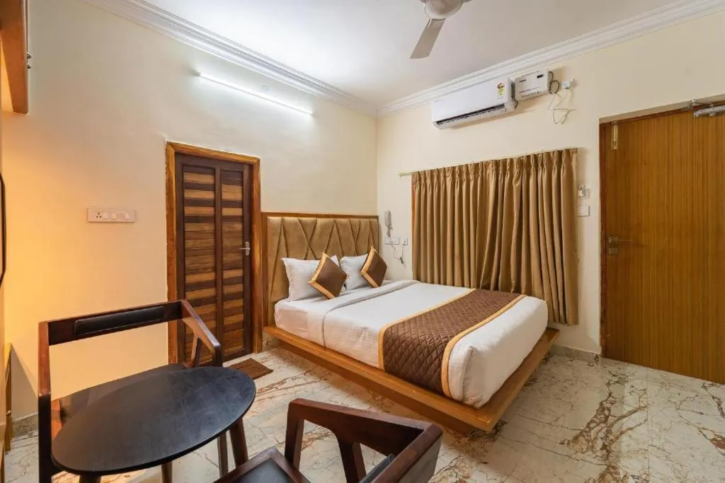 Bed in AR Phalazzo Resort and Banquets