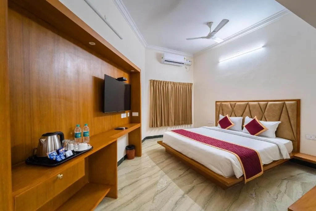 Bed in AR Phalazzo Resort and Banquets