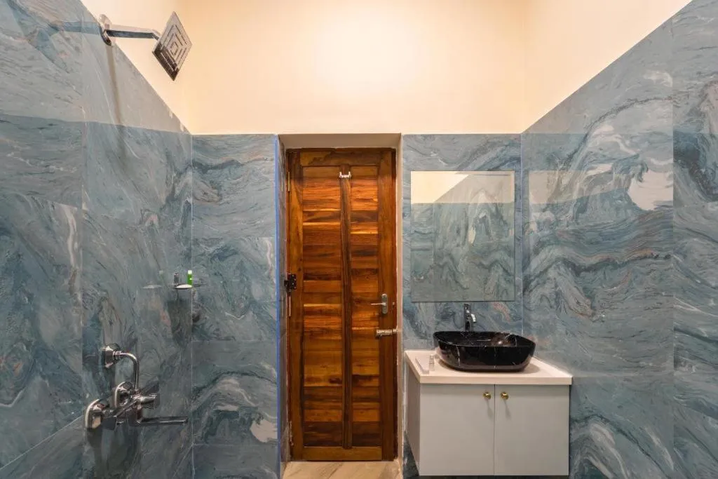 Bathroom in AR Phalazzo Resort and Banquets