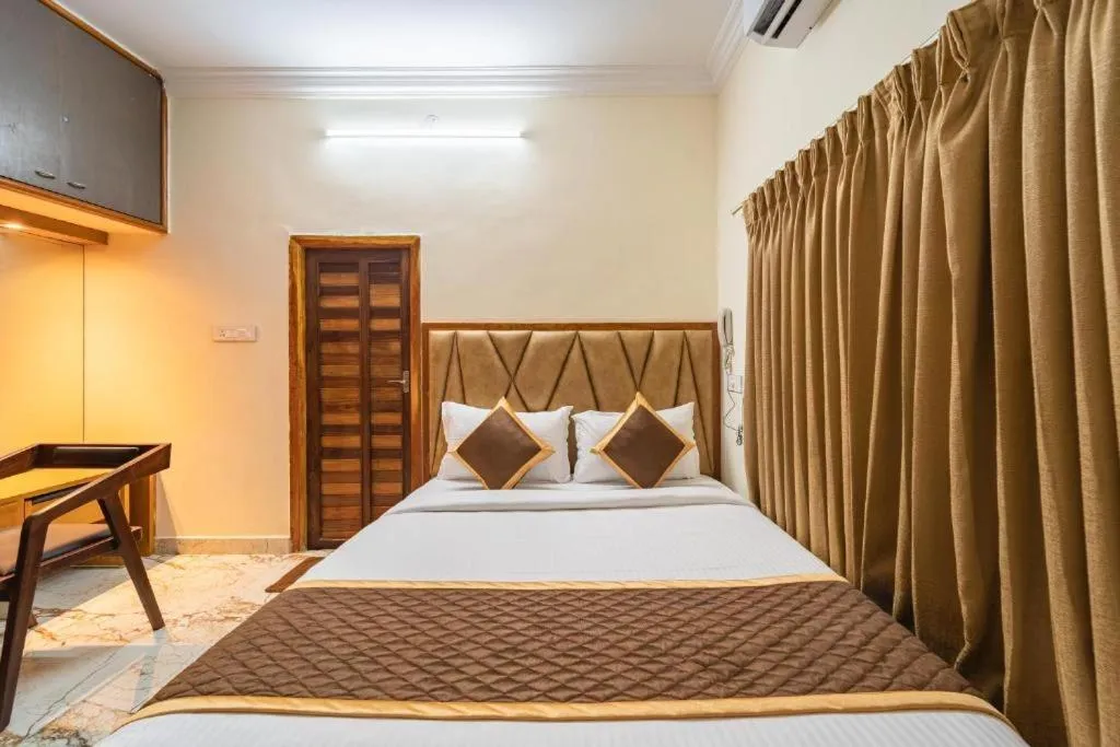 Bed in AR Phalazzo Resort and Banquets