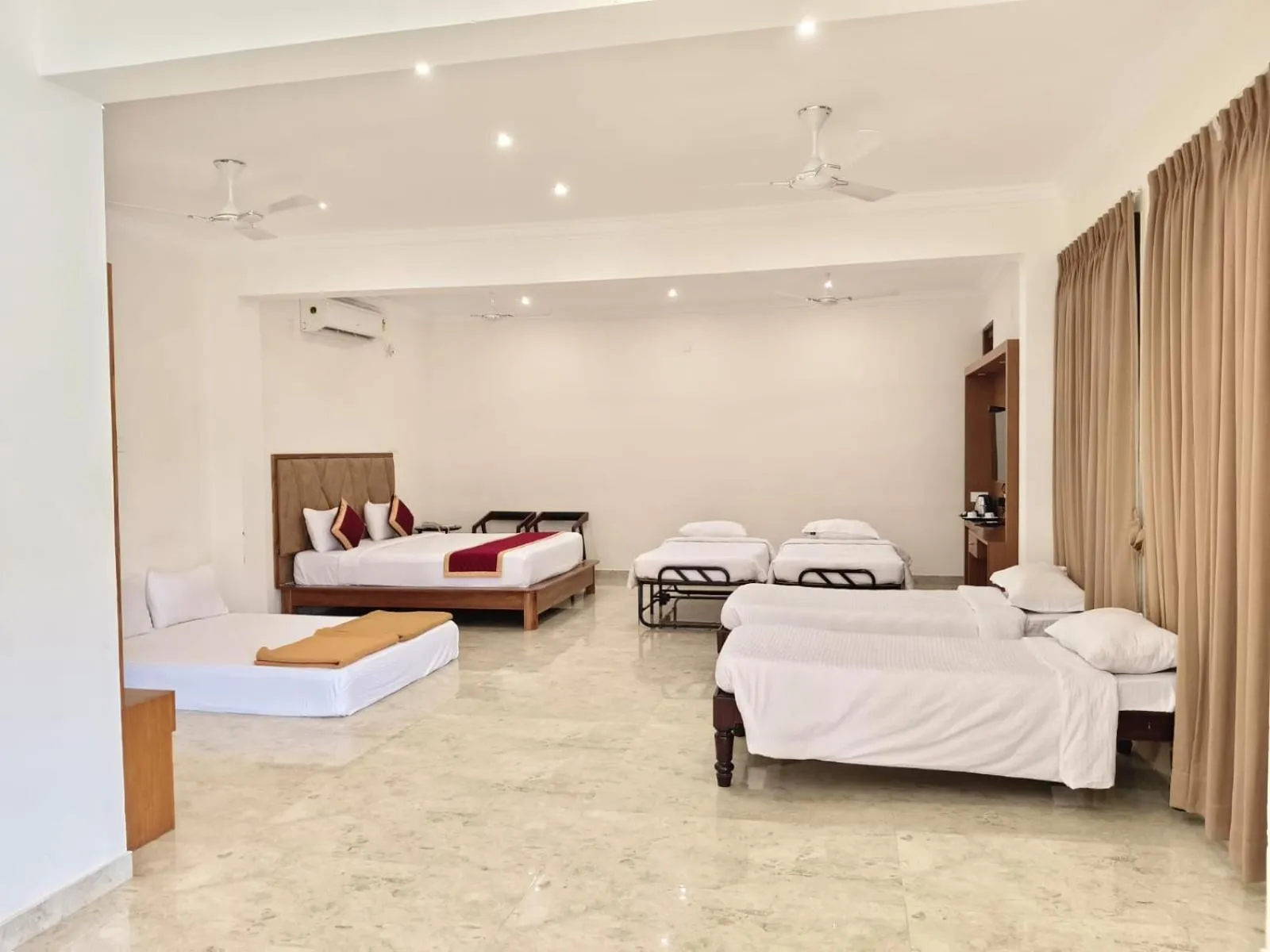 Bed in AR Phalazzo Resort and Banquets