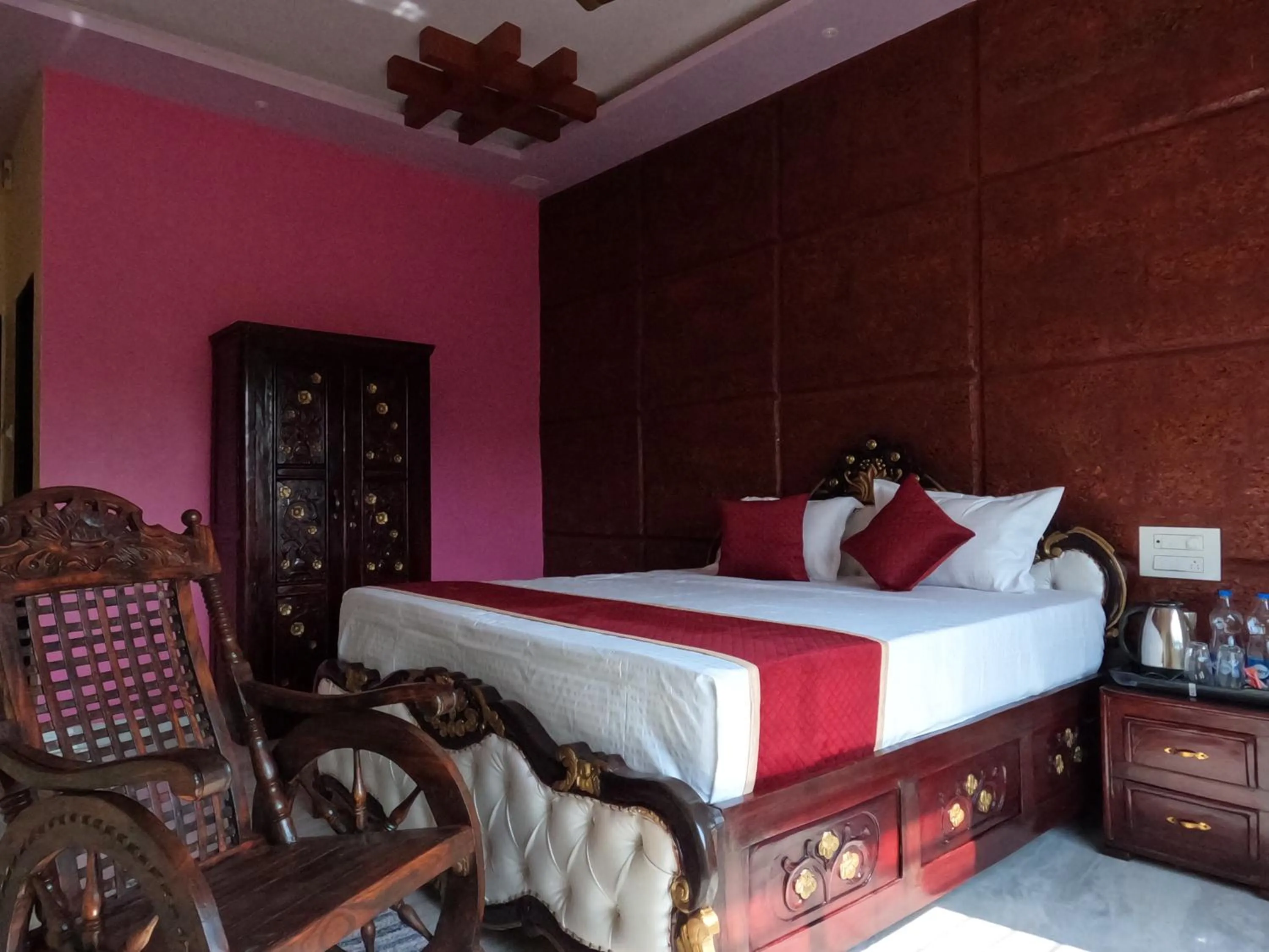 Bed in Kokan Heritage Resort