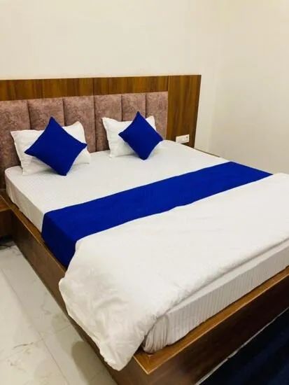 Bed in Hotel Shrinath Palace