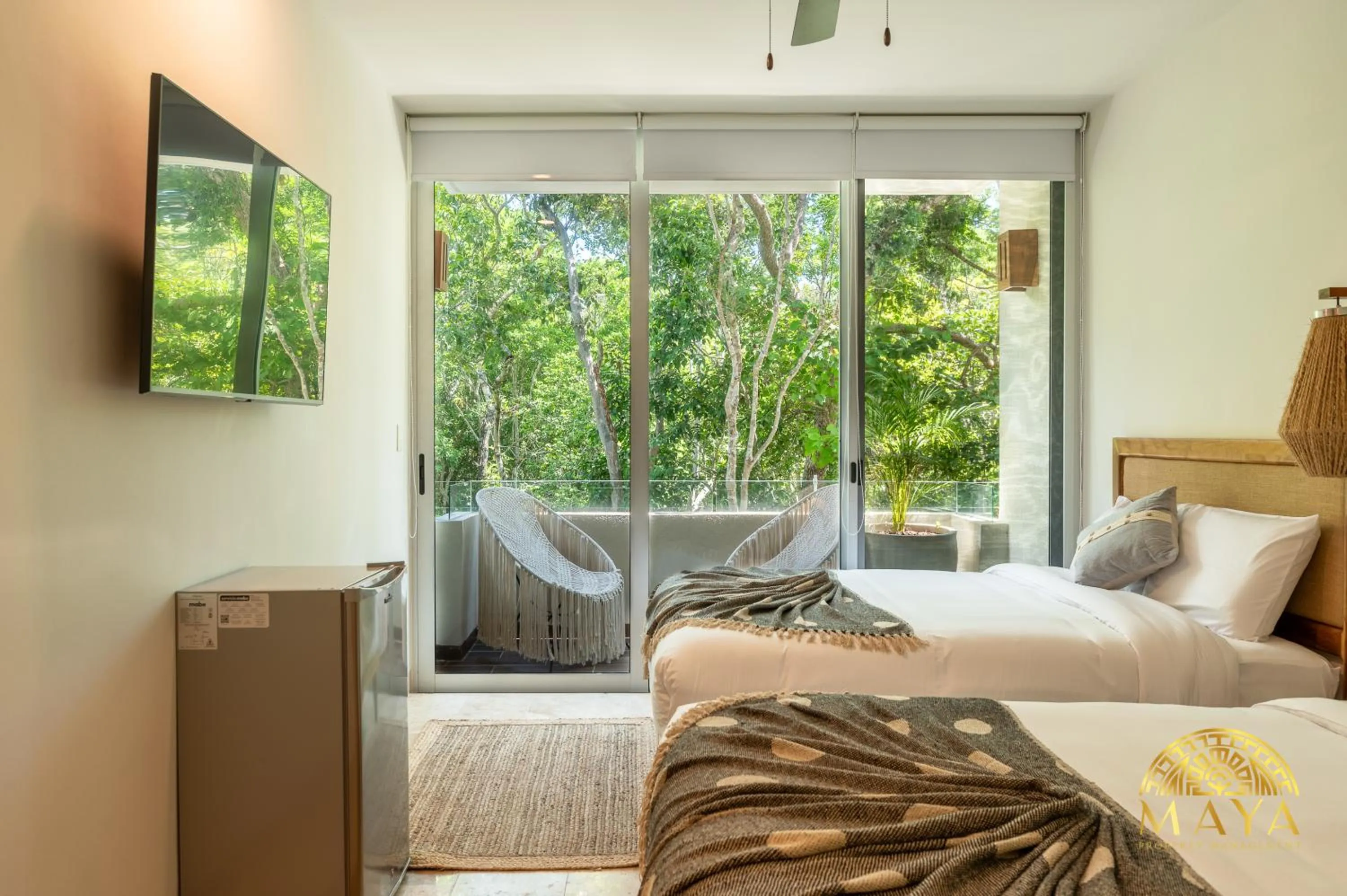 Bed in Nhoa Tulum Aparthotel by Maya PM