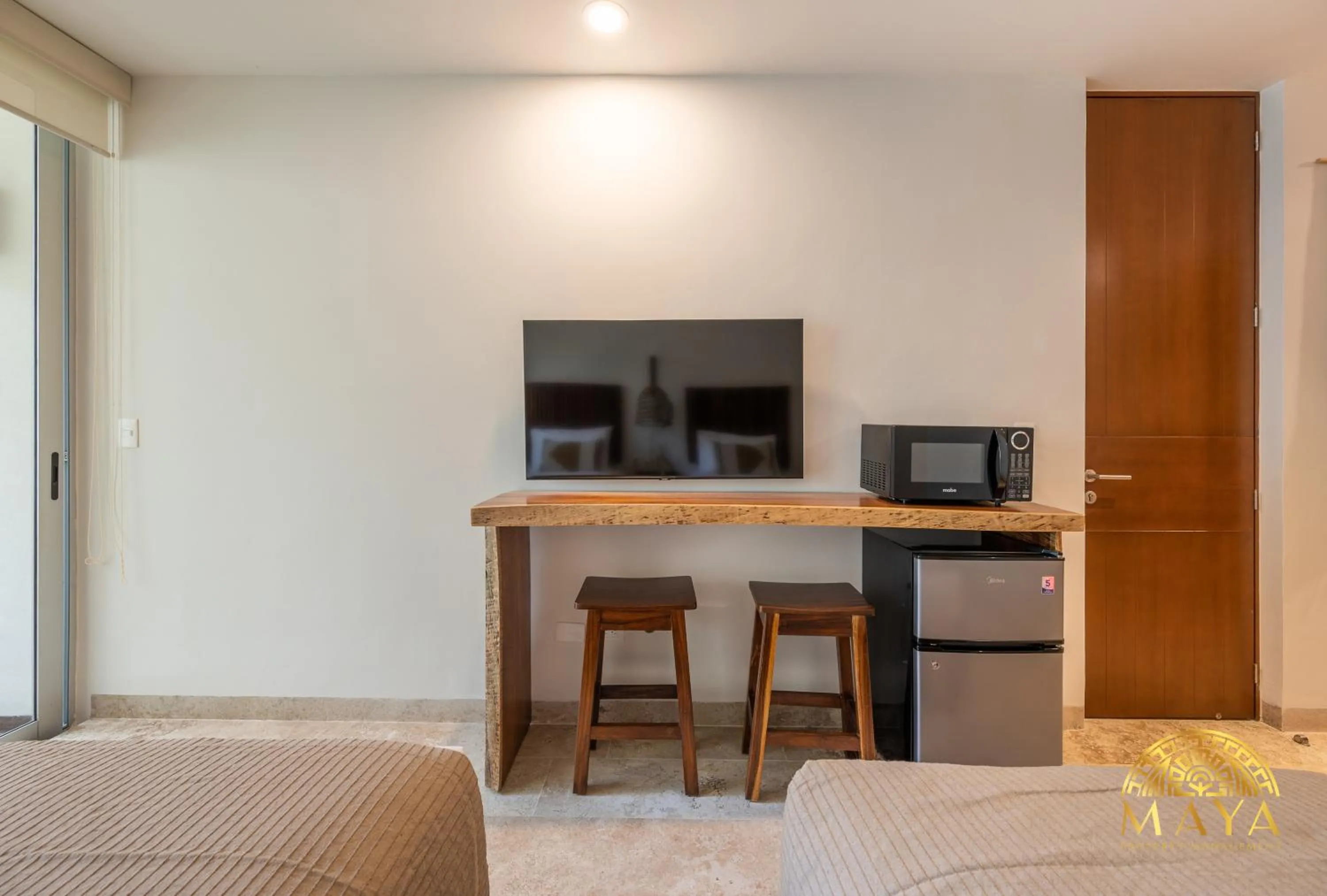 TV and multimedia in Nhoa Tulum Aparthotel by Maya PM