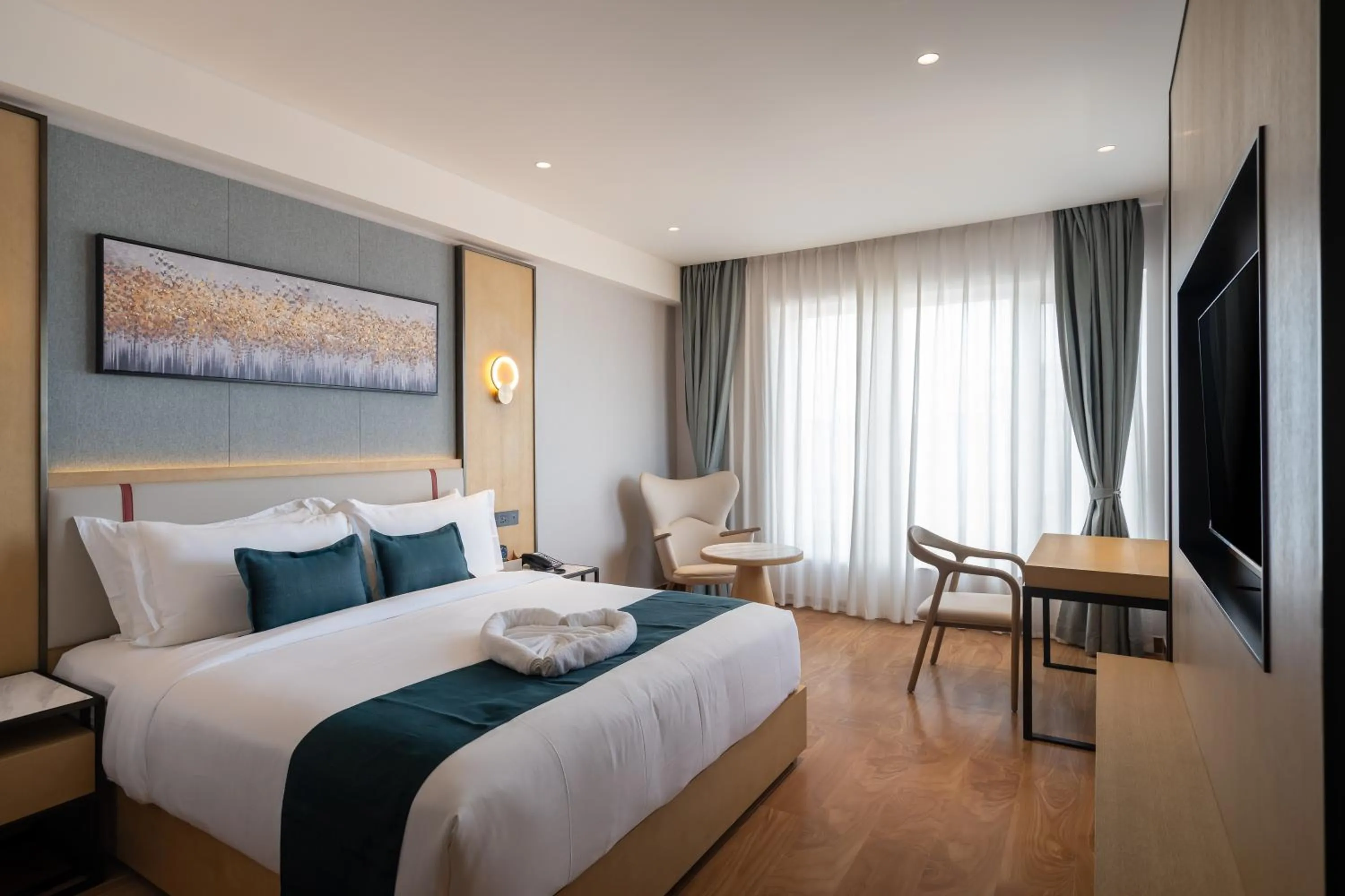 Bed in Copper Leaf Hotels, Tirunelveli