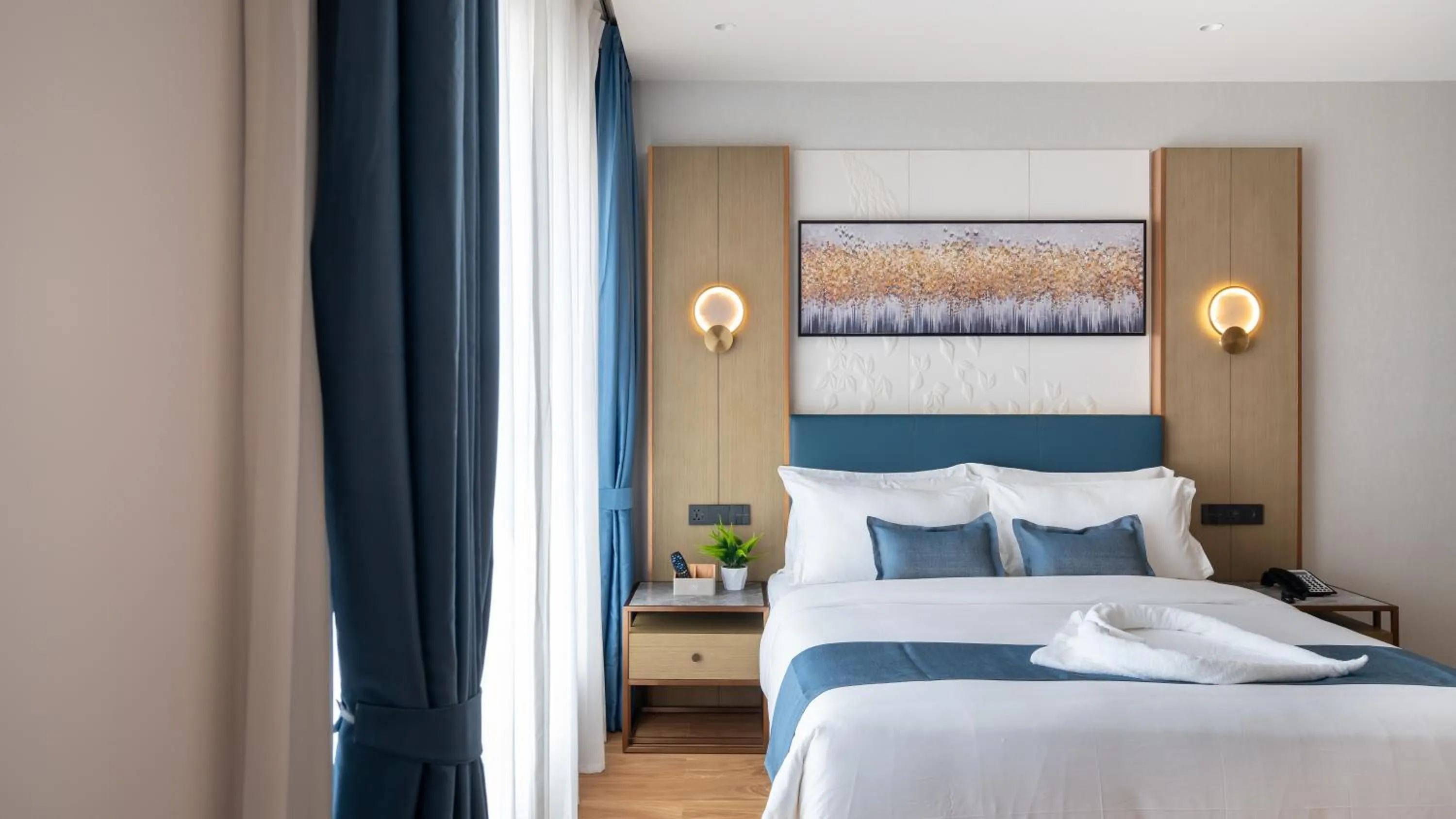 Bed in Copper Leaf Hotels, Tirunelveli