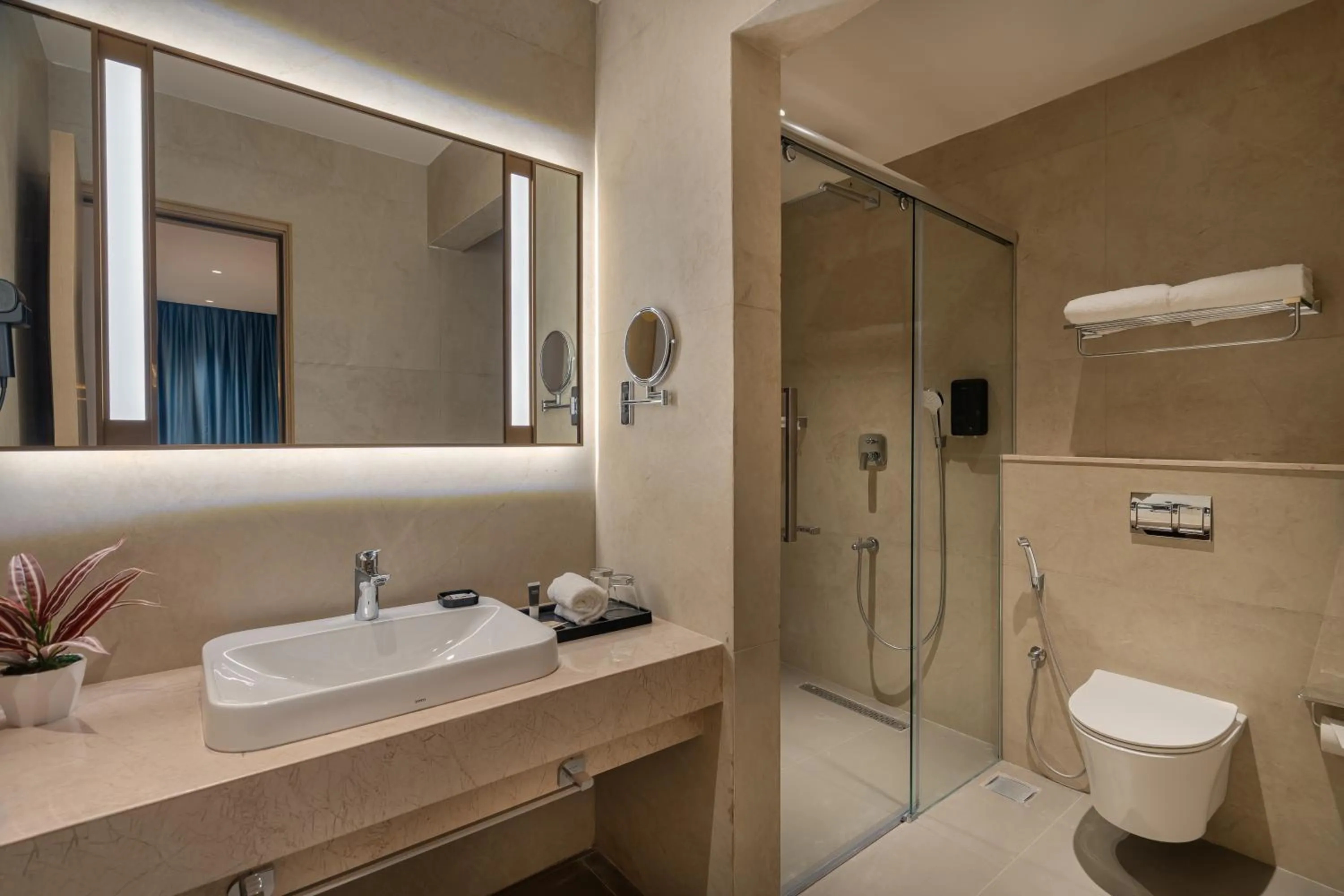 Shower in Copper Leaf Hotels, Tirunelveli